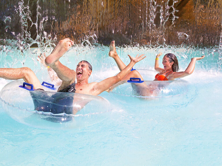 Couple on inner tubes